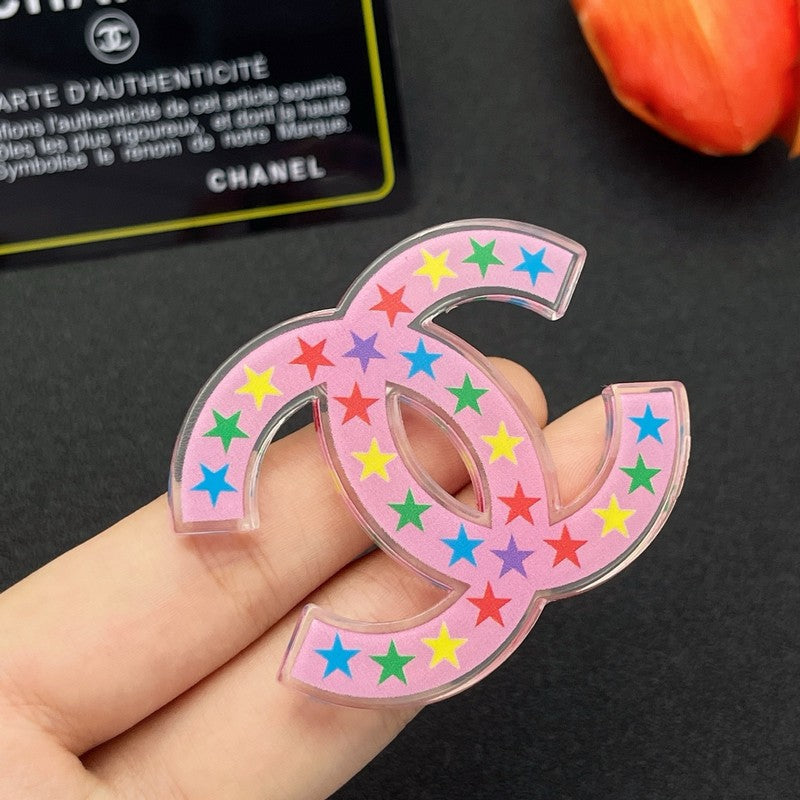 18K  Chanel Pink & Black Star Brooch