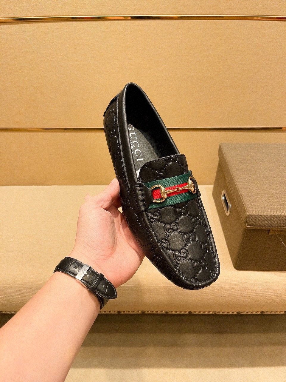 Gucci Embossed Loafers with Green and Red Band — model