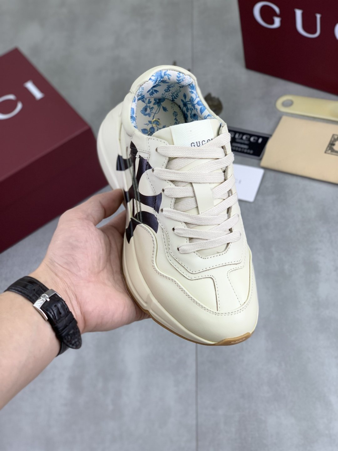 Gucci Cream Chunky Sneakers with Black Accents — model