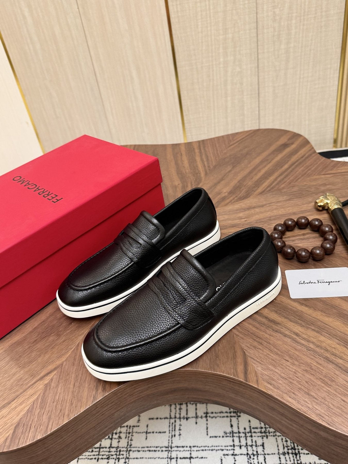 Salvatore Ferragamo Black Loafers with White Soles — front