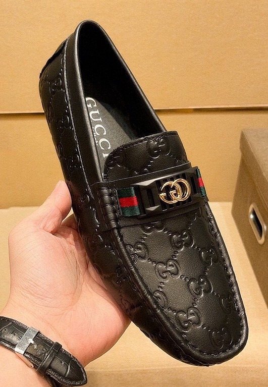 Gucci Black Embossed Loafers — hero