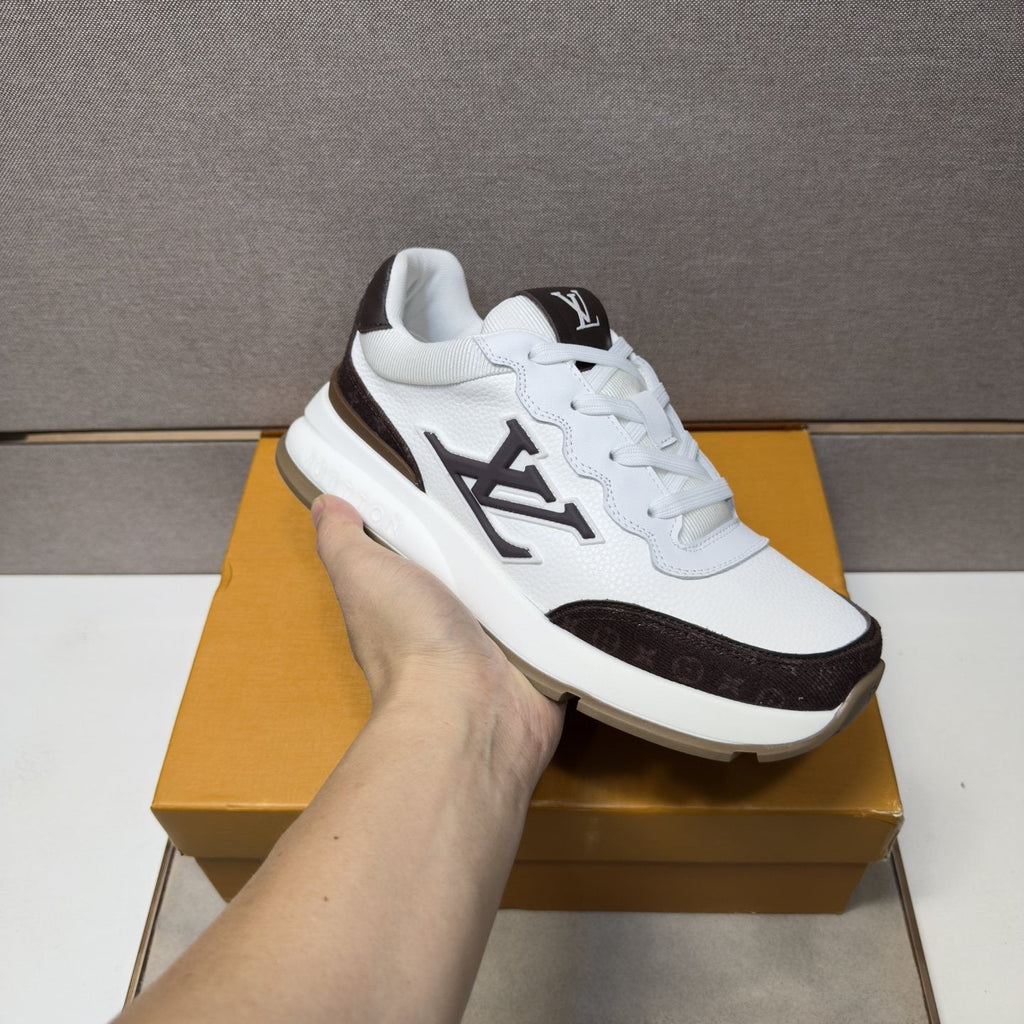 Louis Vuitton Contrast-Trim Low-Top Sneakers — model