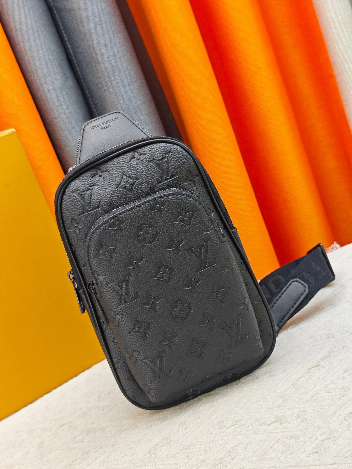 Louis Vuitton Avenue Sling Bag PM in Embossed Monogram — hero