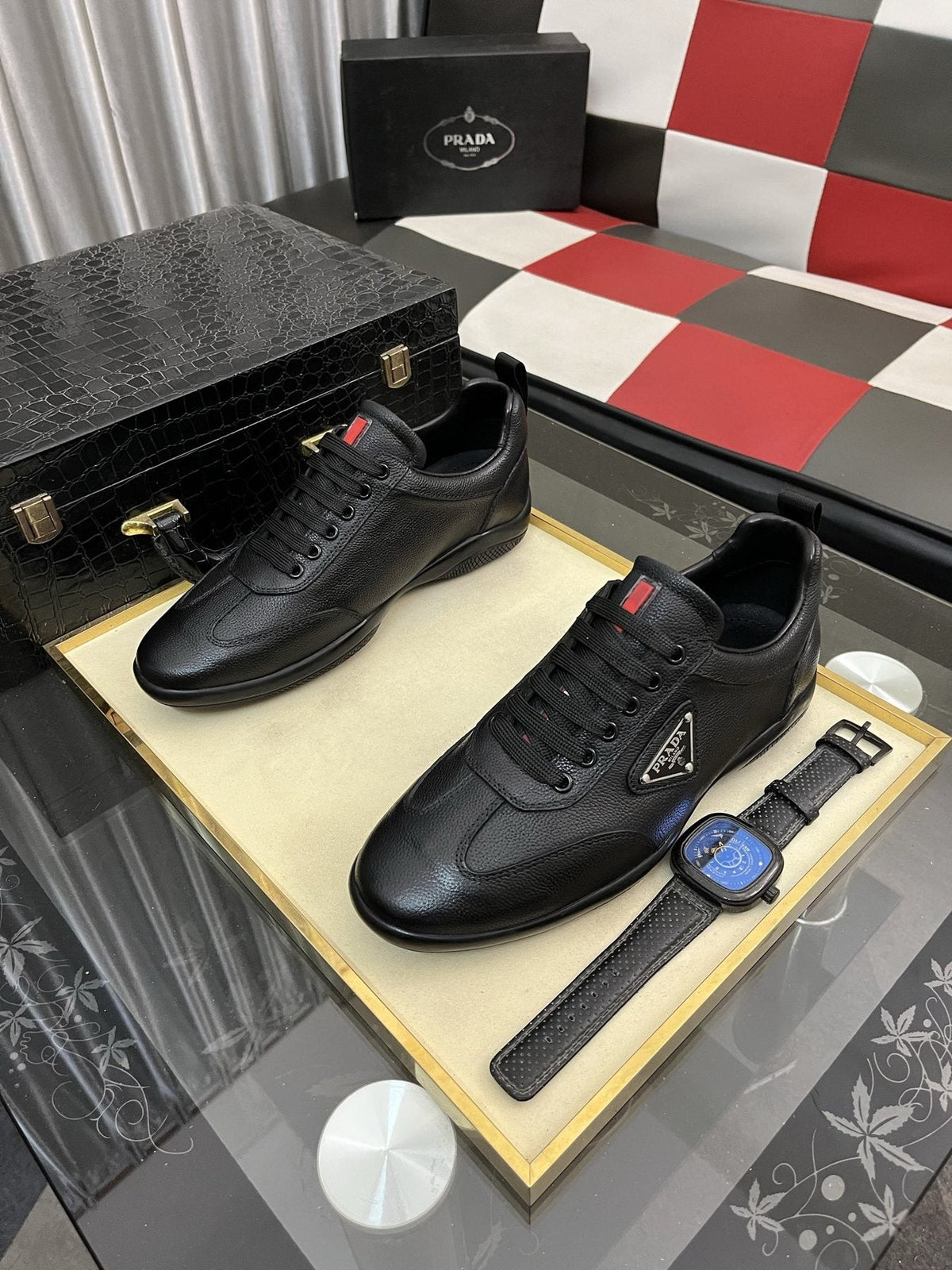 Prada Black Lace-Up Sneakers with Red Tab — front