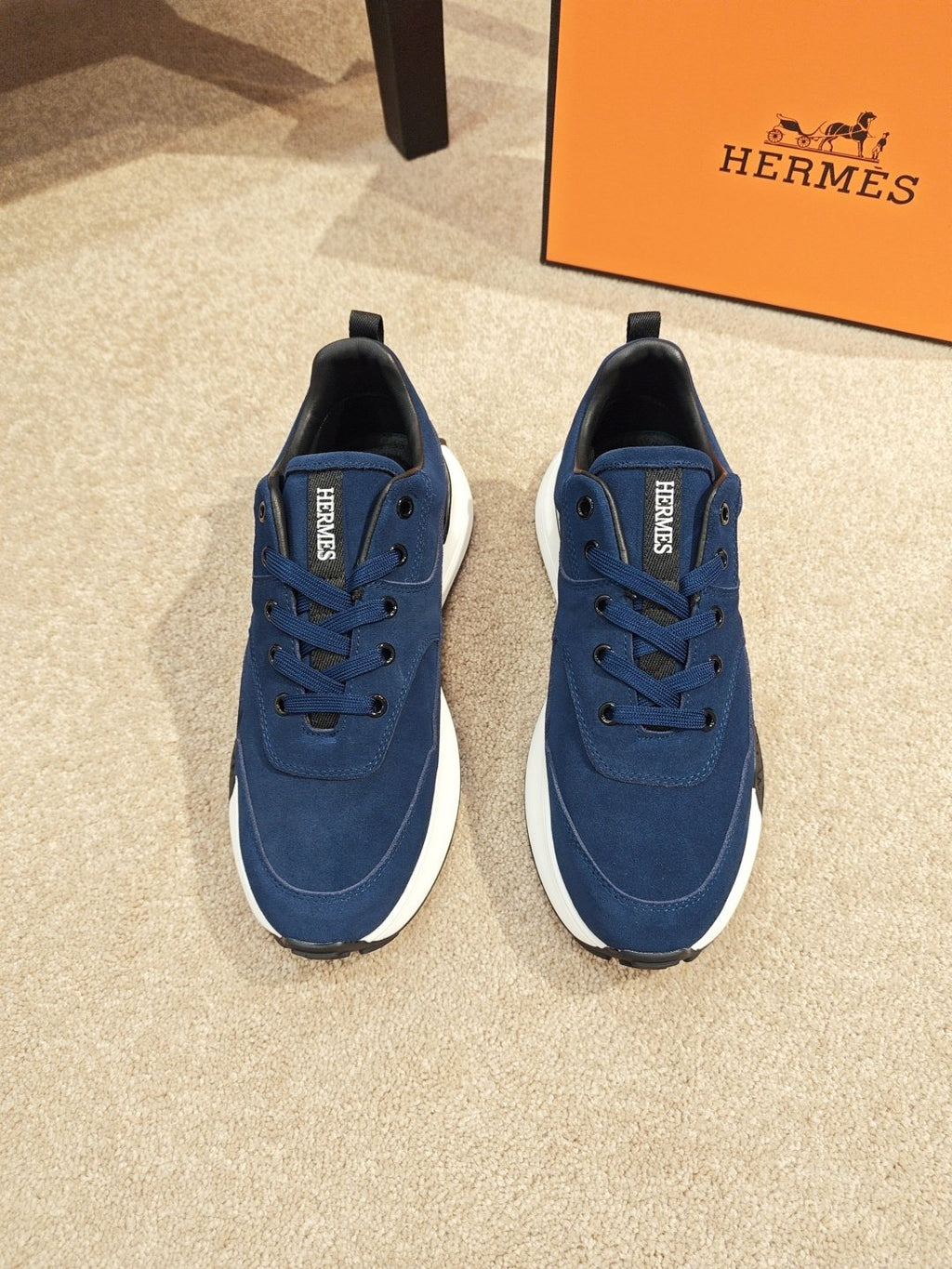 Hermès Lace-Up Sculpted-Sole Sneakers — front