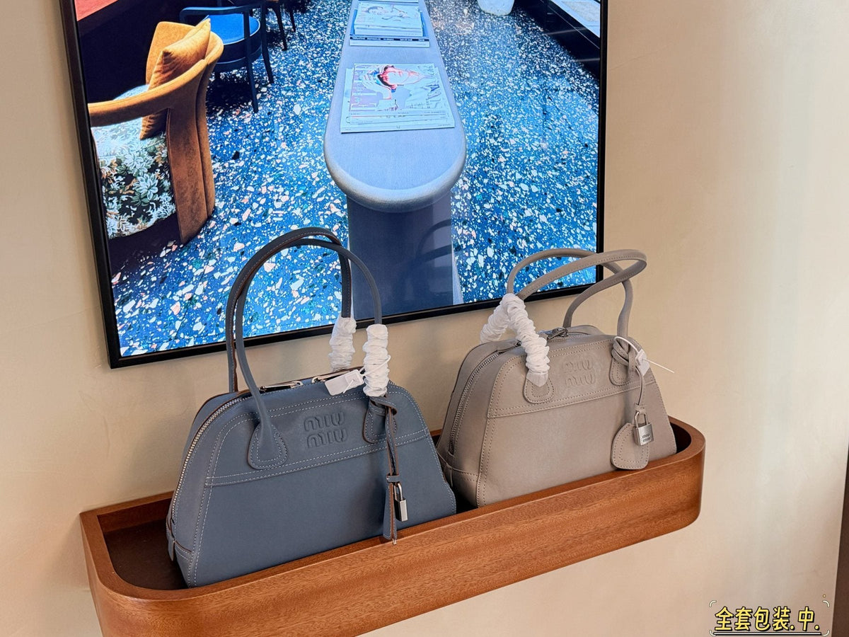 Miu Miu Vivant Bowling Bag — comparison