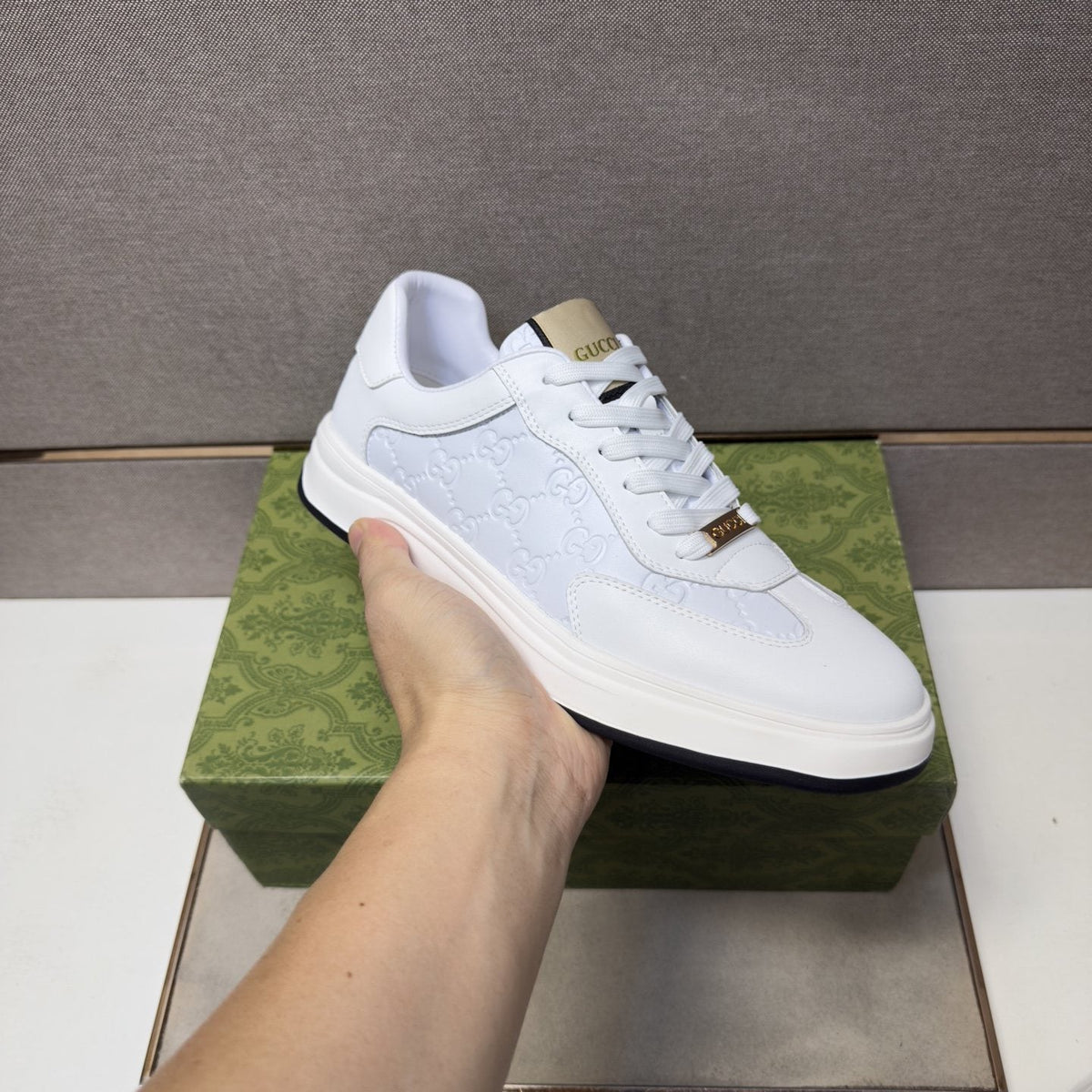 Gucci Men's Embossed Low-Top Sneakers — model
