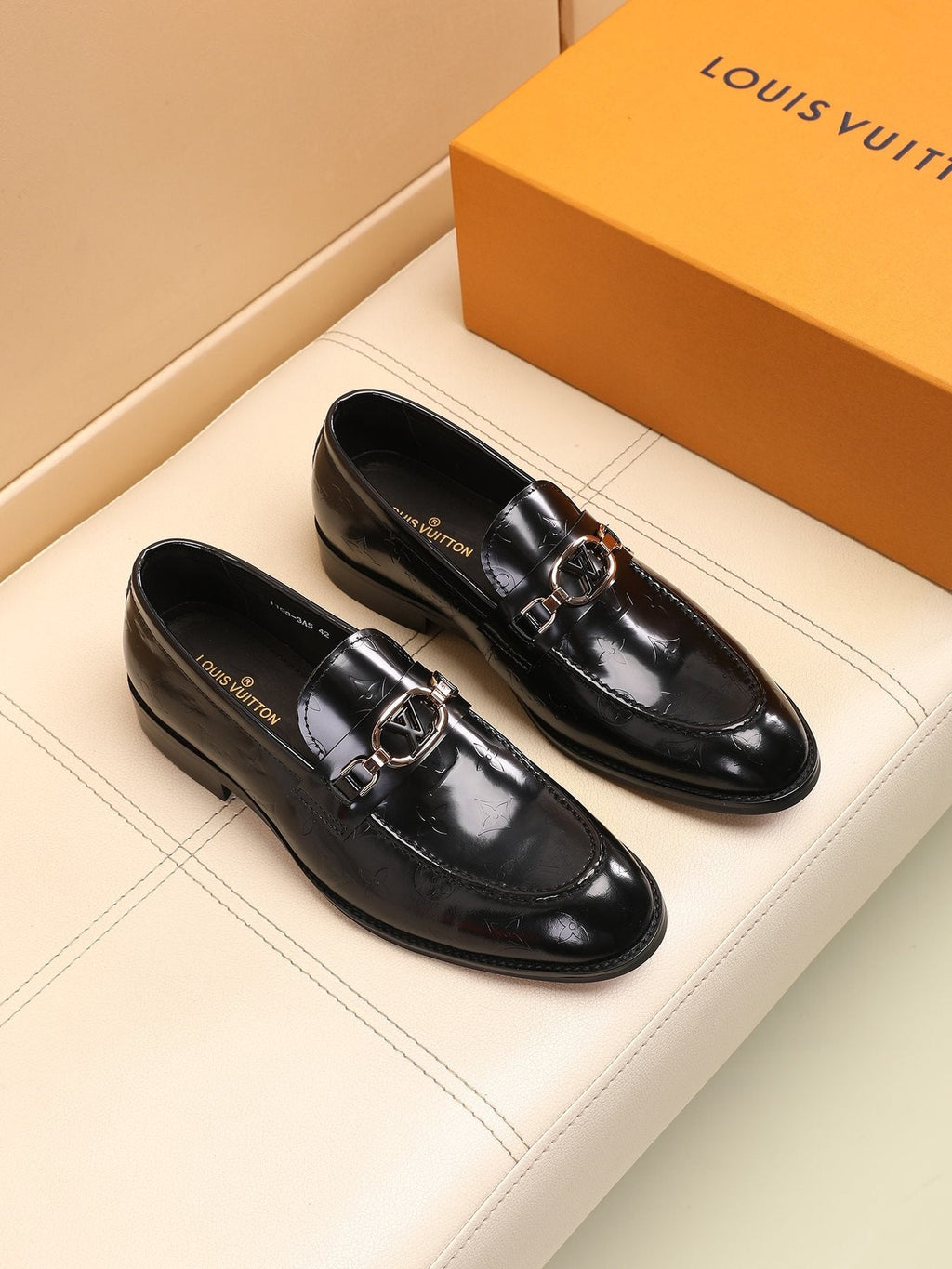 Louis Vuitton Embossed Bit Loafers — front