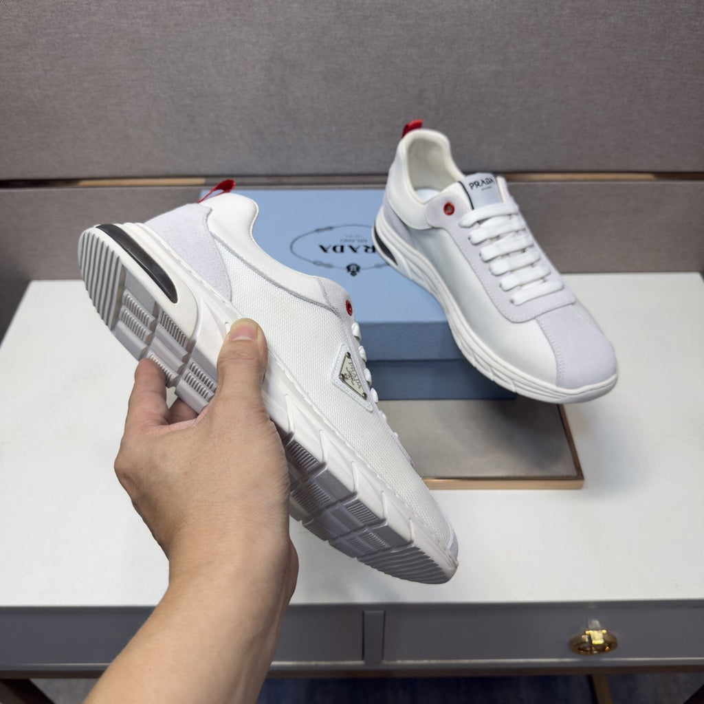 Prada Paneled Low-Top Sneakers — model