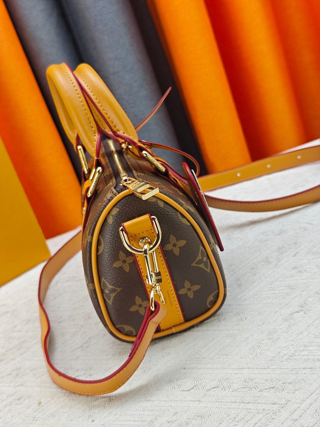 Louis Vuitton Keepall Monogram Barrel Bag — side