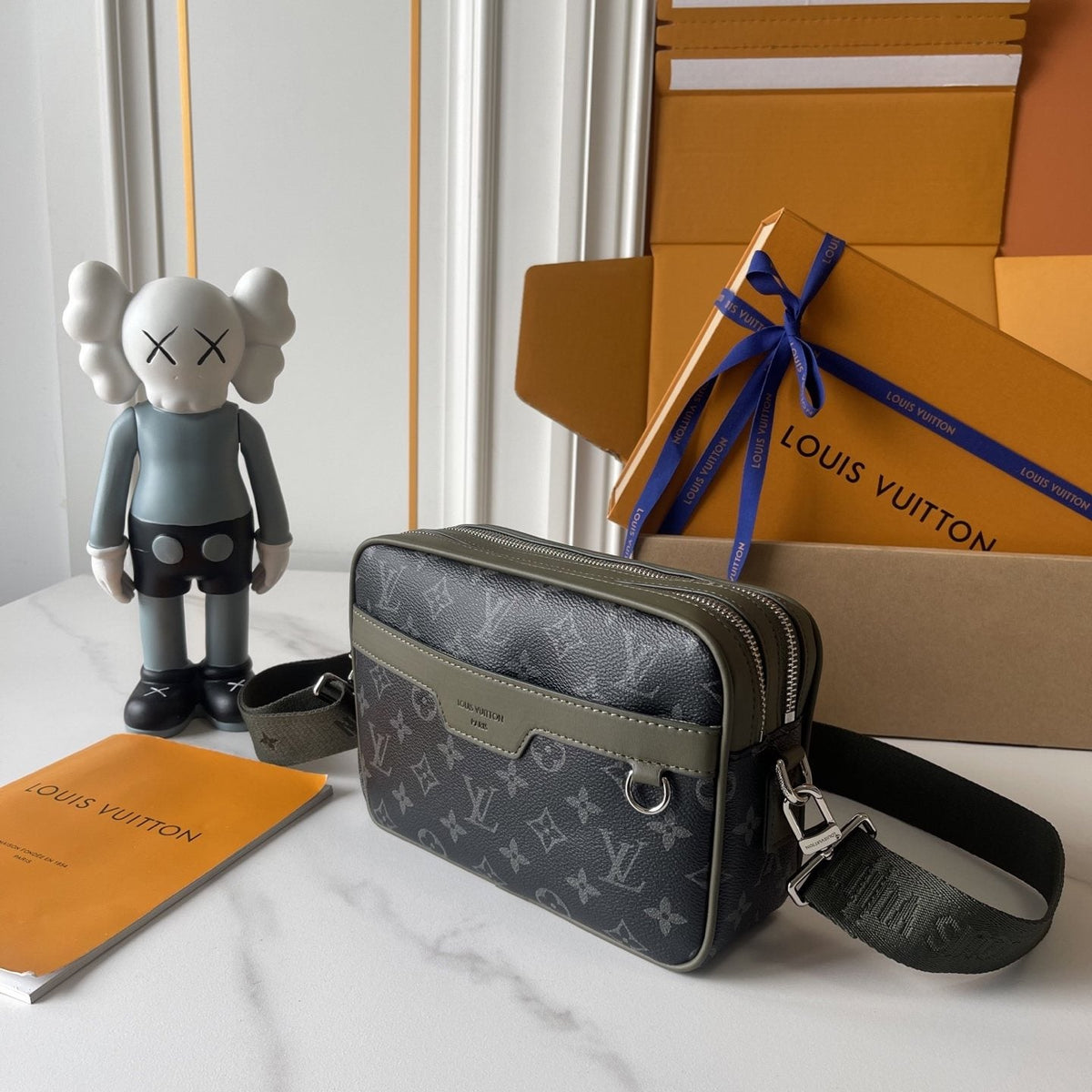 Louis Vuitton Alpha Monogram Messenger Bag — side