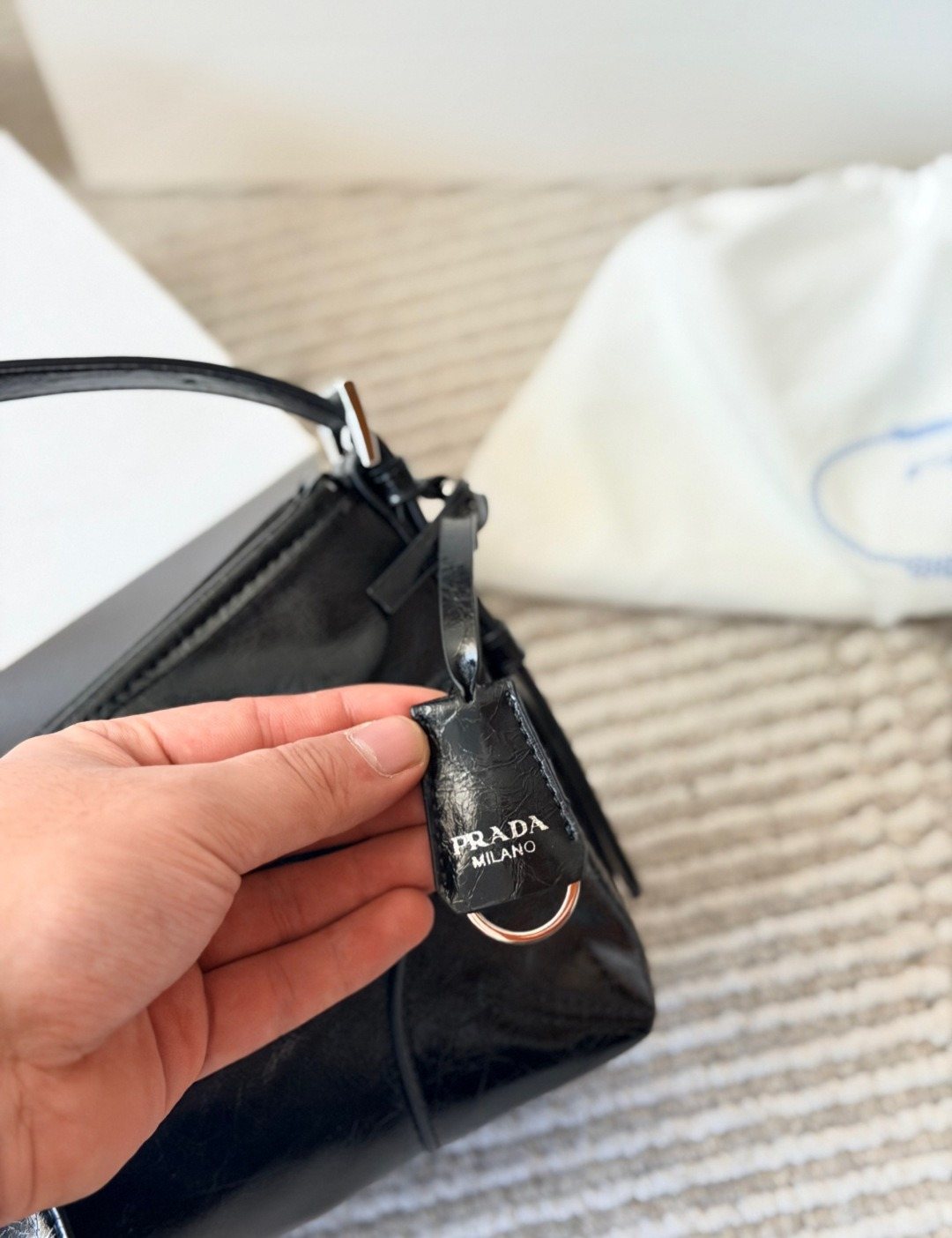 Prada Glossy Crescent Shoulder Bag — detail