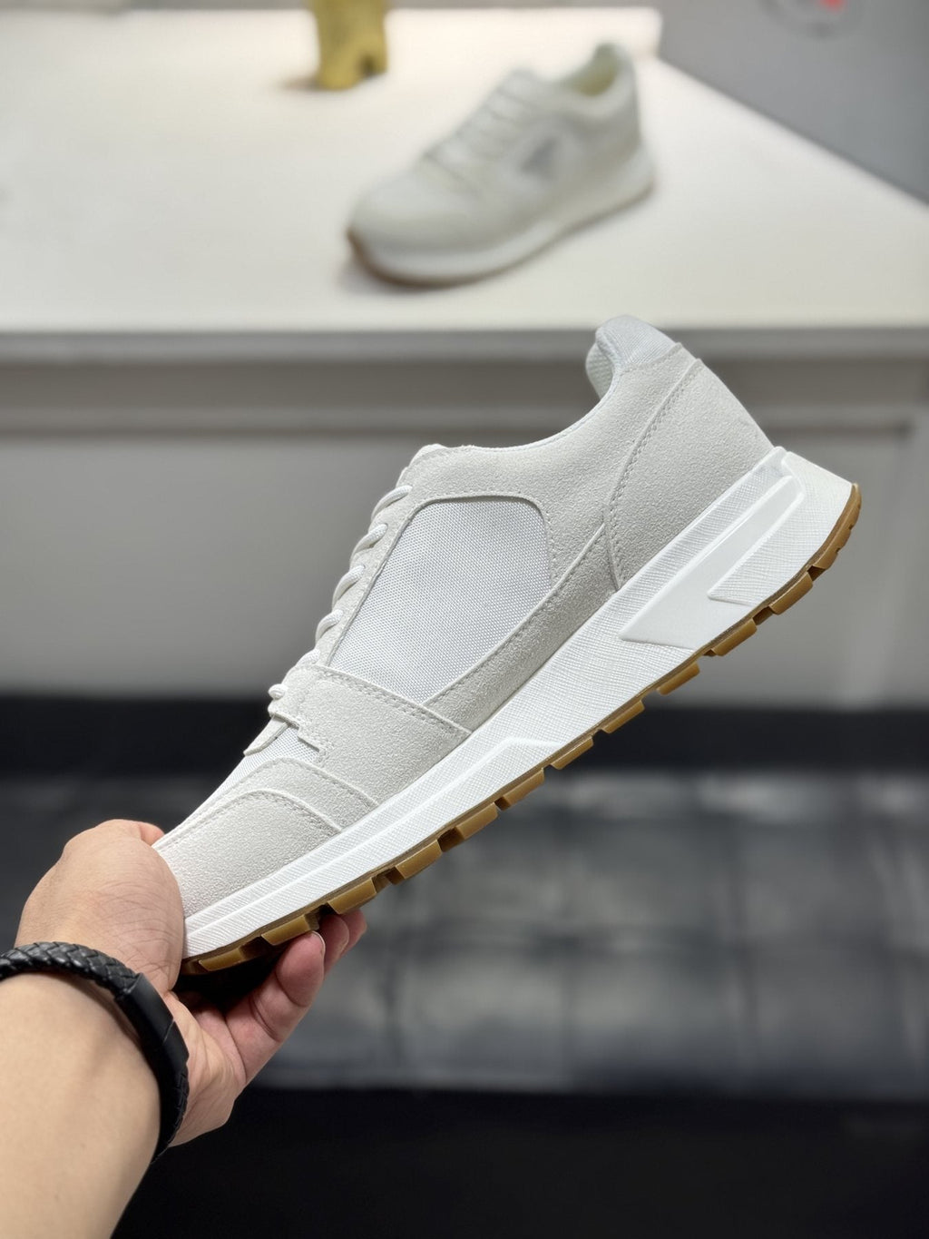 Prada Paneled Chunky-Sole Sneakers — model
