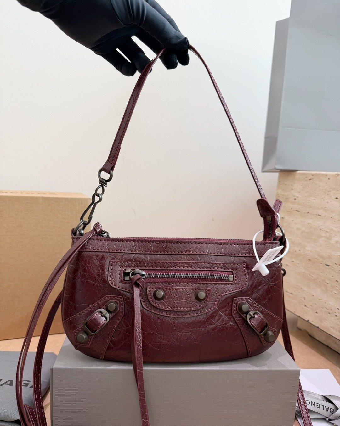 Balenciaga Studded Shoulder Bag with Long Zipper Ties — model
